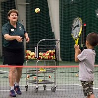 Diane Selke teaching Tennis